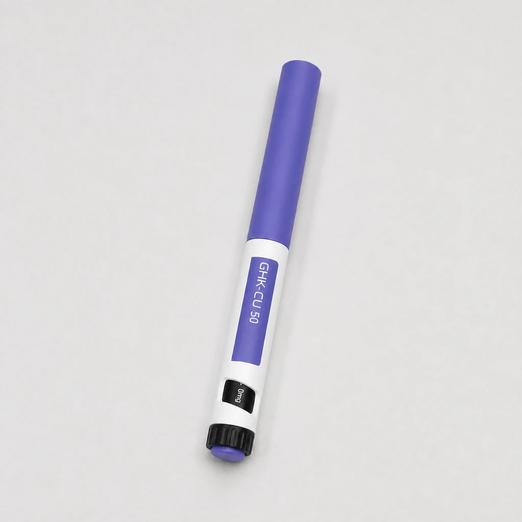 Peptides in Bali GHK-CU 50 pen resting on a light neutral studio surface.