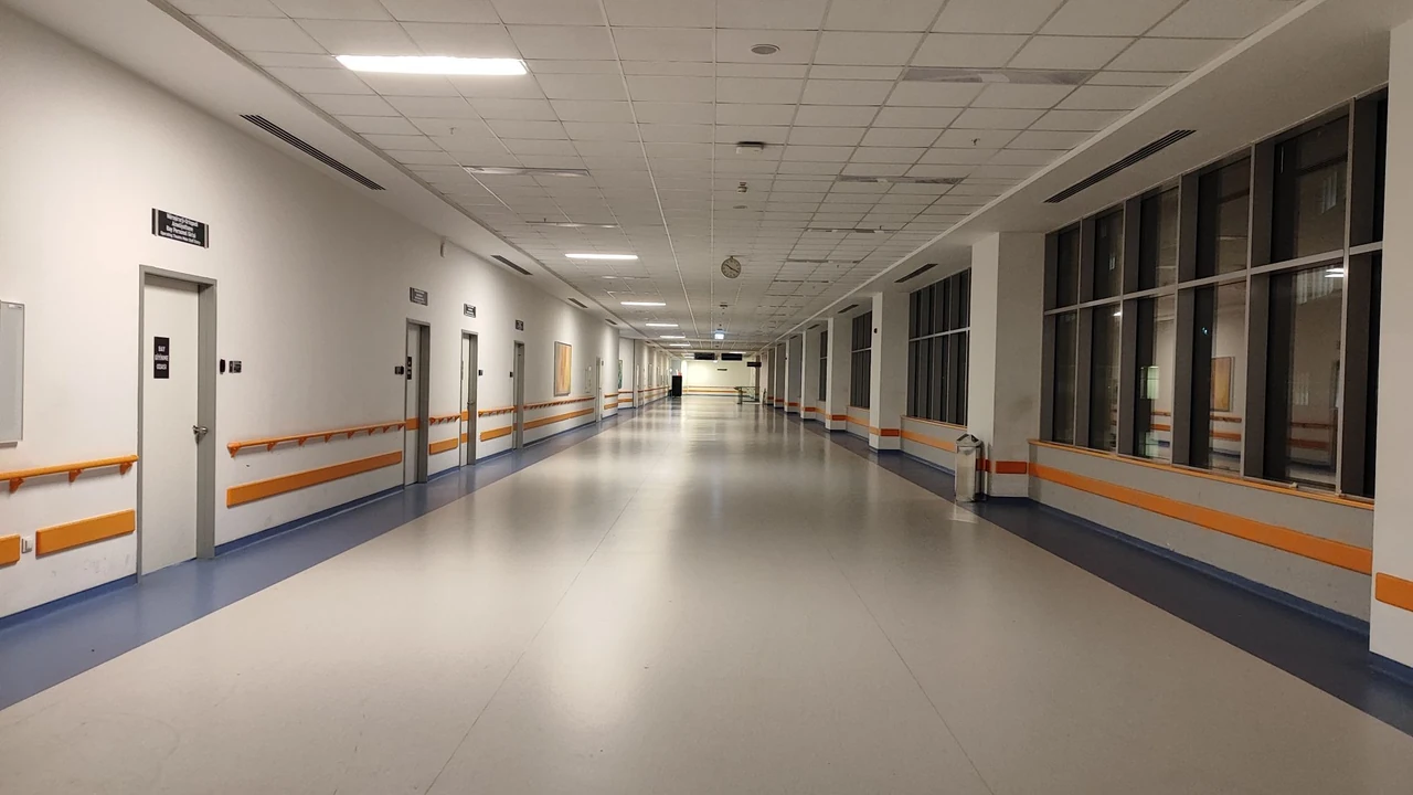 Bright hospital corridor with patient-room doors