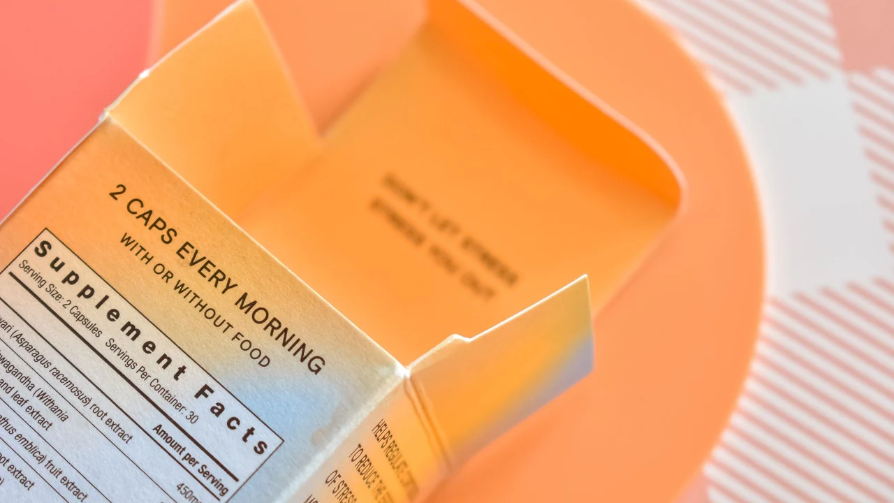 Supplement packaging with a printed ingredients and directions panel.