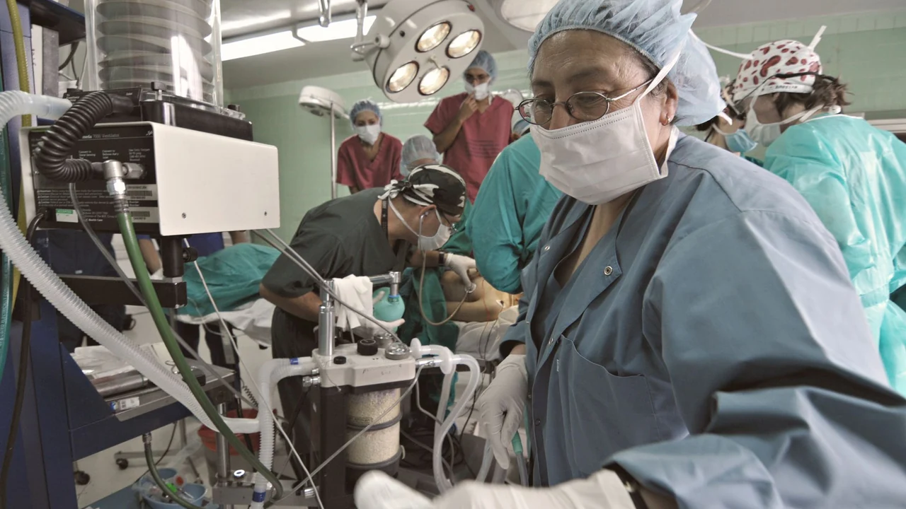 A clinical team working in an operating room.