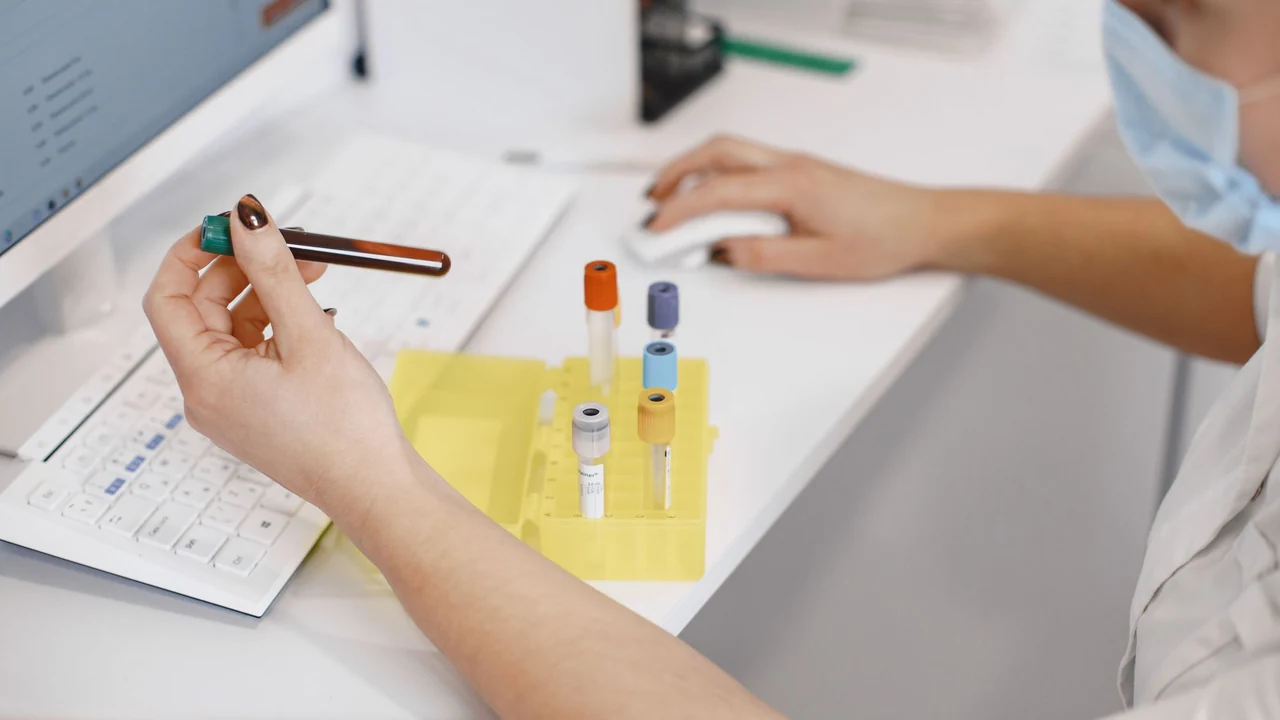 Laboratory samples and paperwork prepared for examination.