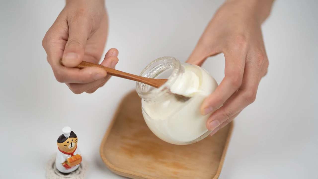 Plain yogurt in a glass jar