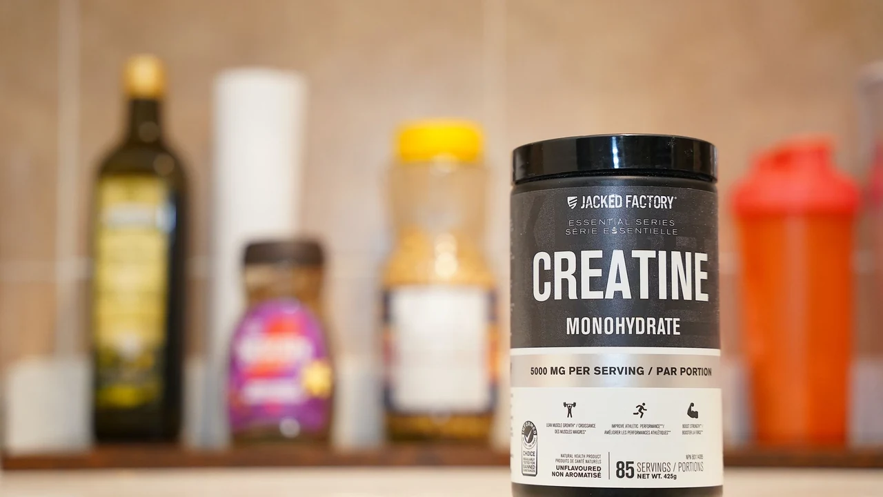 Container labelled creatine monohydrate on a counter