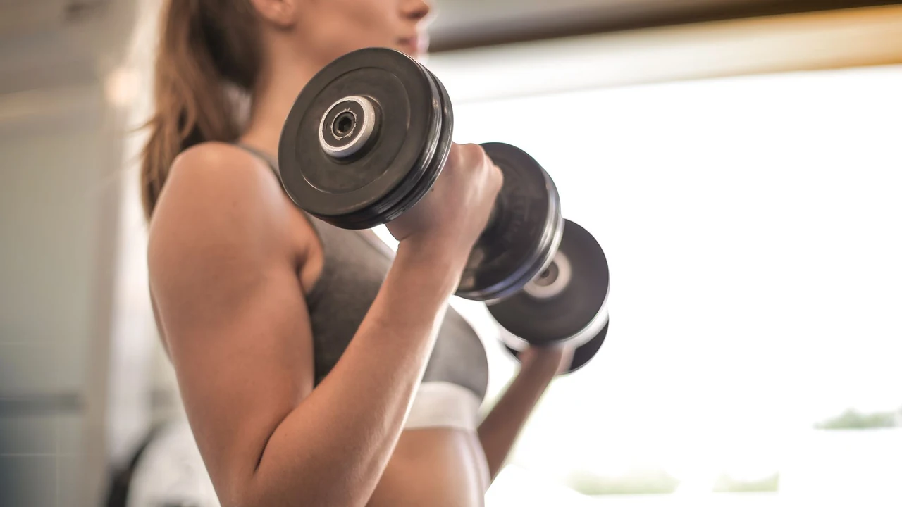 Woman performing a dumbbell curl