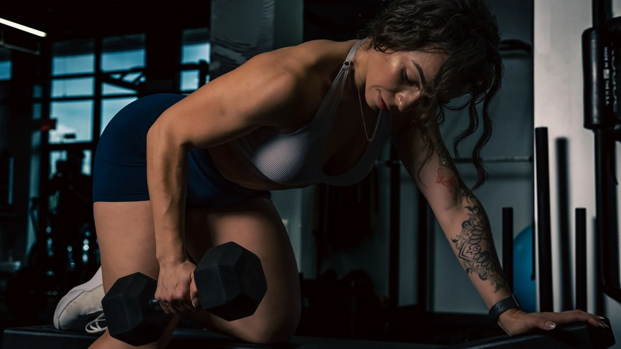 Woman performing a one-arm dumbbell row