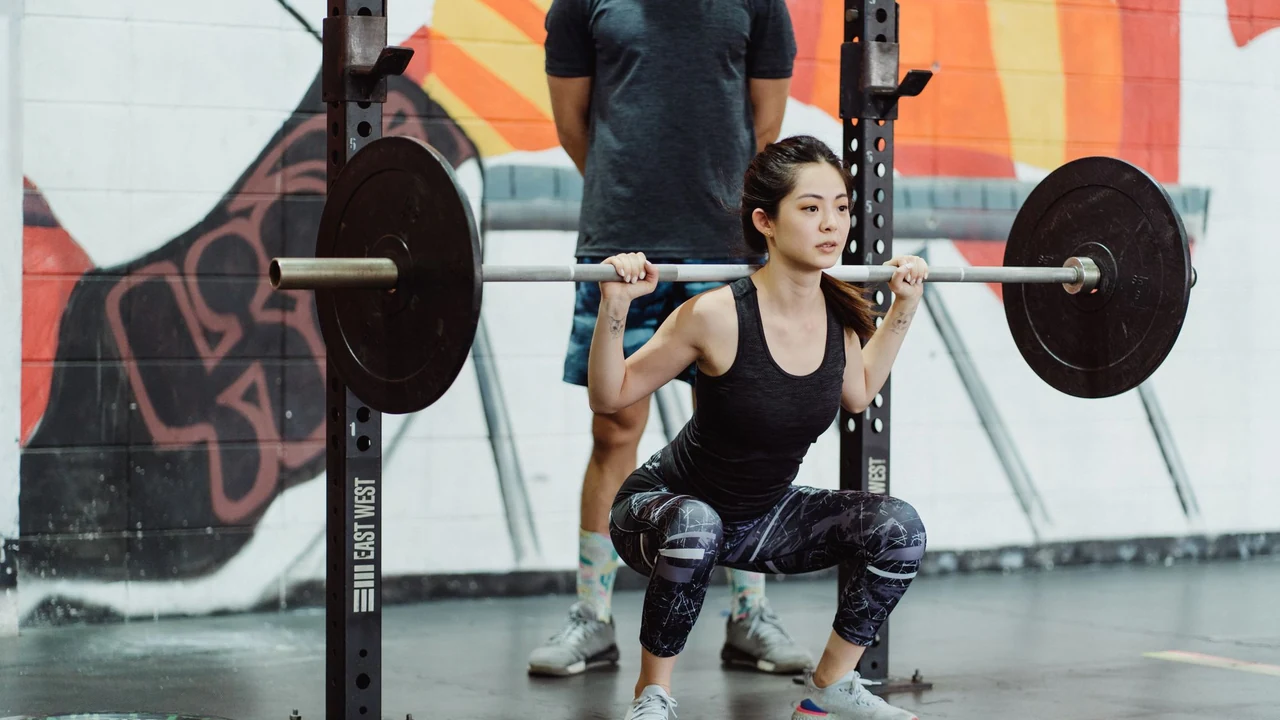 Woman performing a barbell squat