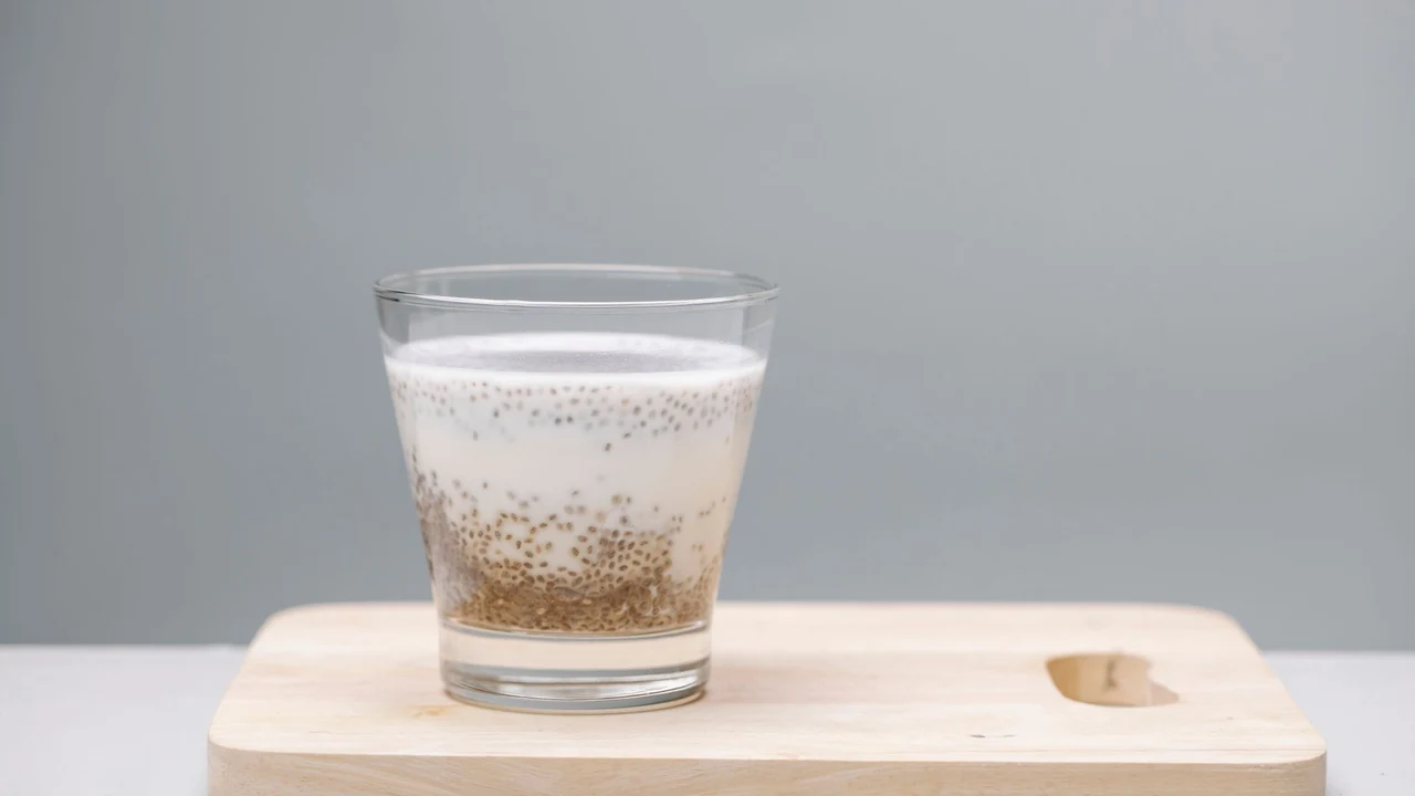 Chia seeds soaking in a glass.